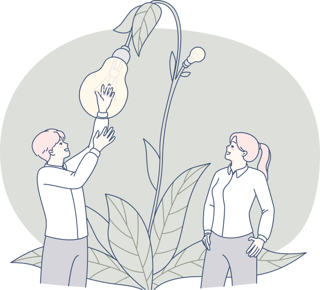 女性と男性が木になっている電球を見ている写真