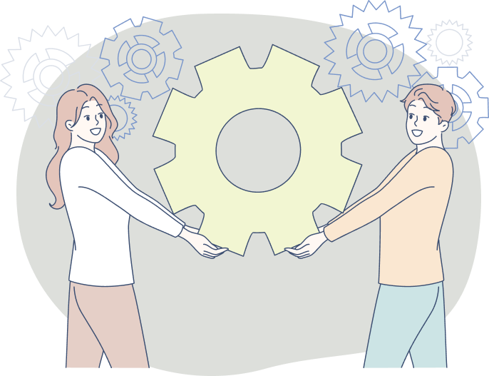 女性と男性が歯車を触っている写真